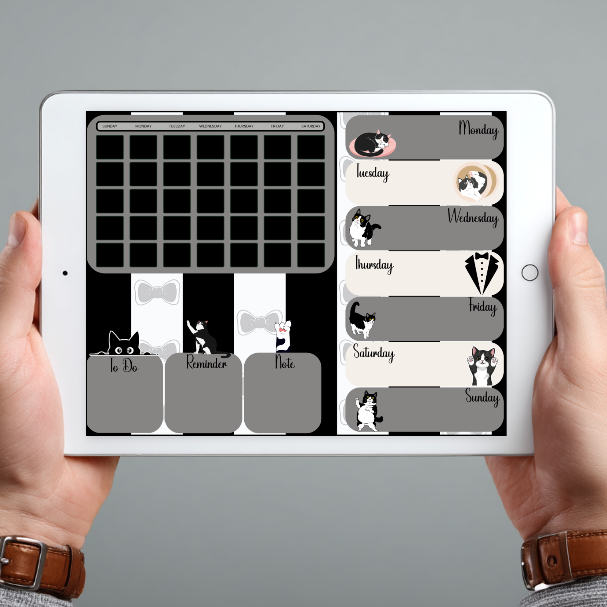 A tuxedo cat-themed digital planner page on a tablet.